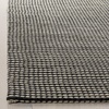 SAFAVIEH Area Rug 8×10 – Natura Collection – Large – Ivory, Handmade Wool, Ideal for Living Room, Bedroom, Dining Space (NAT801A)(Ivory/Black)