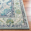 SAFAVIEH Monaco Collection Area Rug – 8′ Round, Forest Green & Light Blue, Non-Shedding & Easy to Clean, Distressed Medallion Design, Ideal for Living Room, Bedroom, Dining Space (MNC243F)(Light Blue / Ivory)