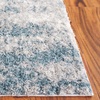 SAFAVIEH Berber Shag Collection Area Rug – 9′ x 12′, Ivory & Blue, Abstract Design, Non-Shedding & Easy Care, 1.2-inch Thick, Ideal for the Living Room, Dining, Bedroom (BER586M)(Ivory/Blue)