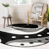 SAFAVIEH Florida Shag Collection Area Rug – 8’6″ x 12′, Dark Blue & Ivory, Abstract Design, Non-Shedding & Easy Care, 1.2-inch Thick Ideal for High Traffic Areas in Living Room, Bedroom (SG473-6511)(Black/Ivory)