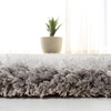 SAFAVIEH Supreme Shag Collection 8′ x 10′ Light Blue SGS621D Handmade Solid 1.5-inch Thick Area Rug(Silver)