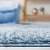 SAFAVIEH Tahoe Shag Collection Area Rug – 9′ x 12′, Beige, Solid Design, Non-Shedding & Easy Care, 1.2-inch Thick Ideal for High Traffic Areas in Living Room, Bedroom (THO670B)(Blue)