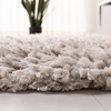 SAFAVIEH Rio Shag Collection 8′ x 10′ Black/Ivory SG960H Handmade 1-inch Thick Area Rug(Beige/Ivory)