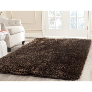 SAFAVIEH Saint Tropez Shag Collection 9′ x 12′ Snow White STS641W Handmade Solid 1-inch Thick Area Rug(Chocolate)